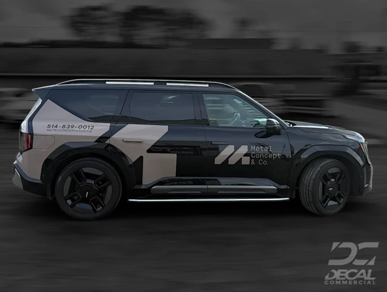 Kia EV9 avec habillage partiel professionnel mettant en valeur le logo et les services de Métal Concept & Co.